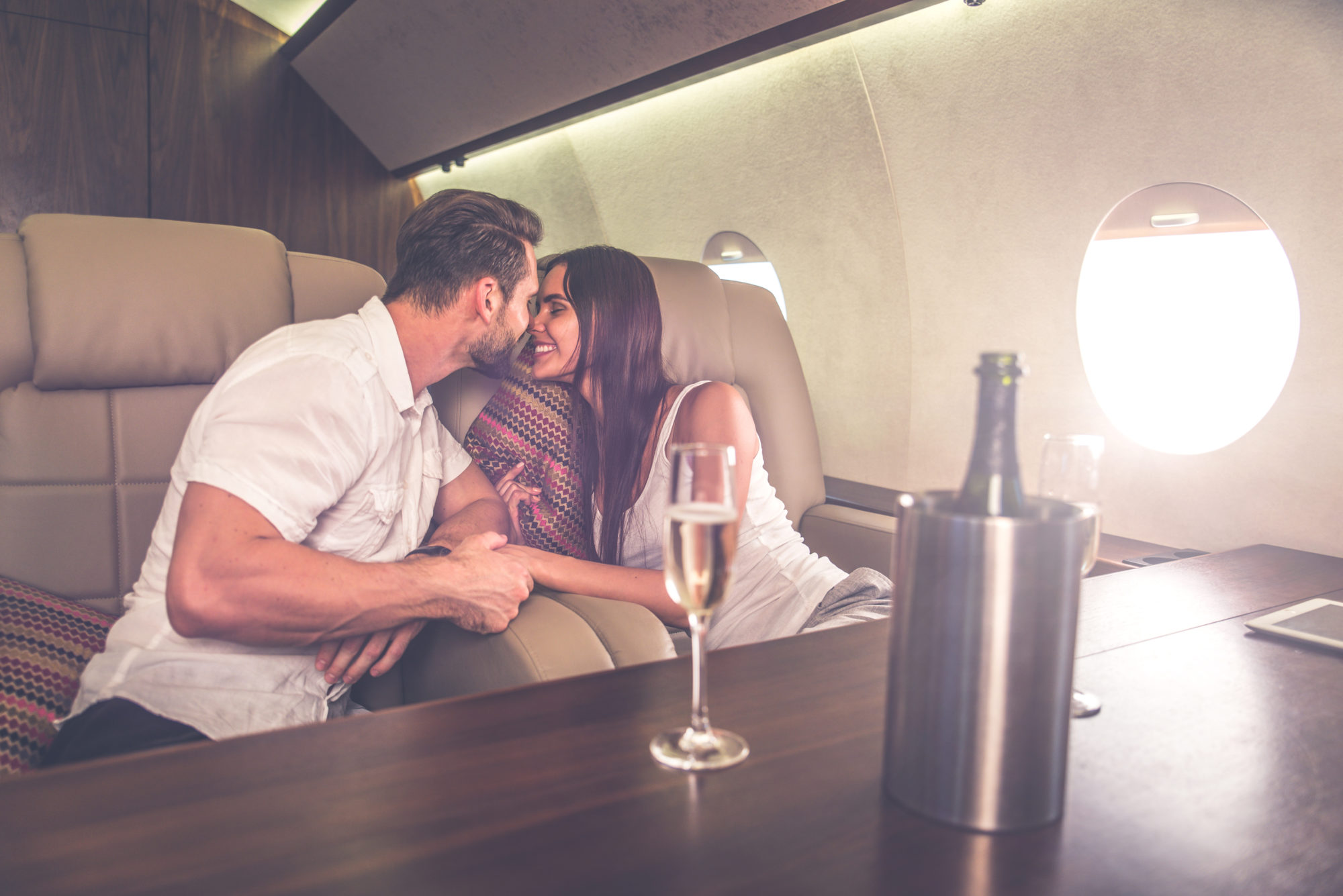 Couple on vacation, flying on their private jet